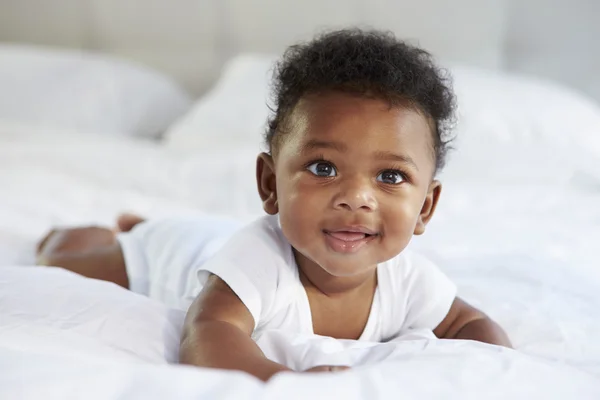 Cute Baby Lying On Bed