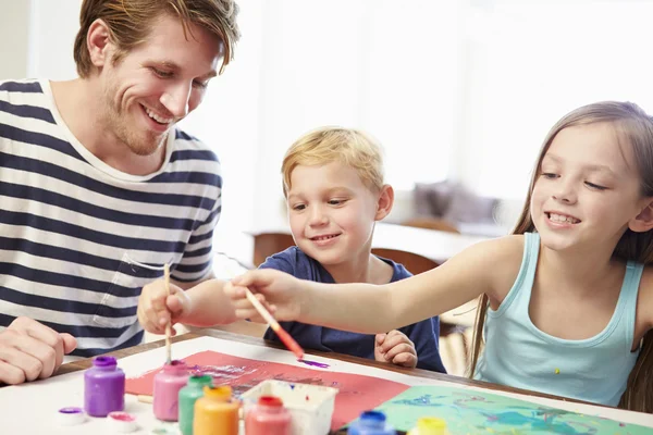Father Painting Picture With Children