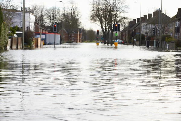 Flooded Urban Road With Traffic Lights