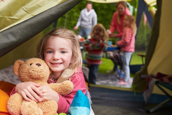 Girl With Teddy Bear Enjoying Camping