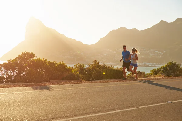 Man and woman running together