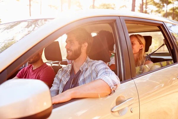 Group Of Friends In Car On Road Trip