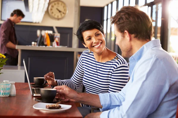 Man and woman meeting  in a restaurant