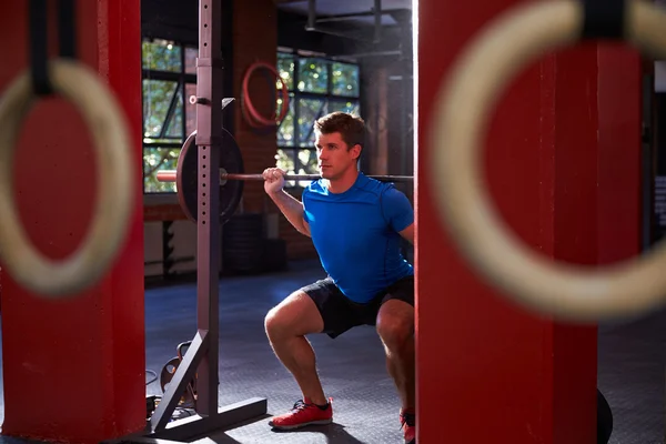 Man Clean And Jerk Lifting Weights