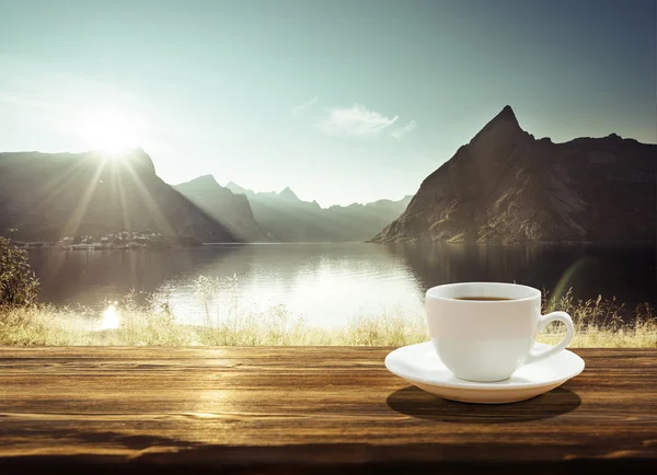 Cup of coffee and sunset in Norway, Lofoten islands
