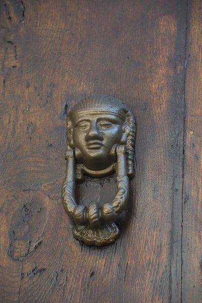 Egyptian face knock door