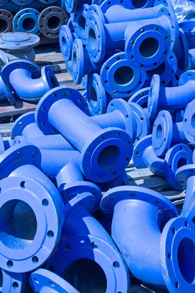 Blue iron pipes on pile