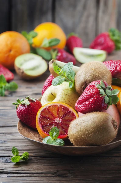Concept of vegan eating with fresh fruits