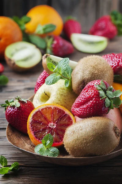 Concept of vegan eating with fresh fruits