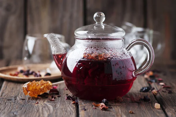 Red hot tea on the wooden table