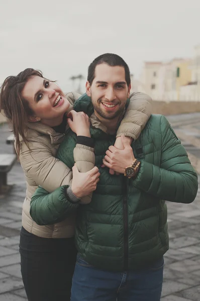 Young couple in love in the small italian city