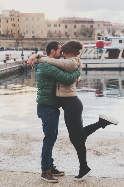 Young couple in love in the small italian city