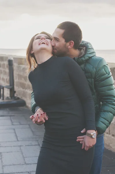 Young couple in love in the small italian city