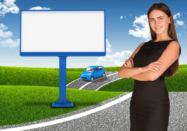 Businesswoman with small car and empty billboard