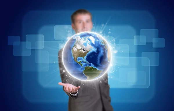 Businessman in suit hold Earth with transparent rectangles