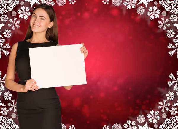 Businesswoman holding empty paper.