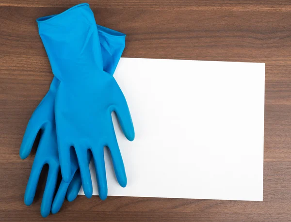 Blank paper with rubber gloves