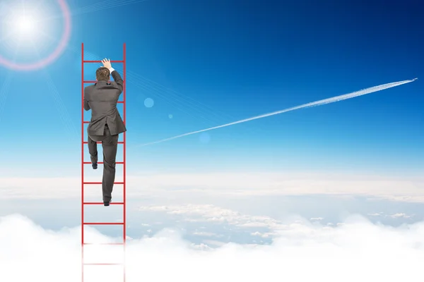 Businessman climbing ladder in sky