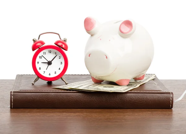 Alarm clock with piggy bank