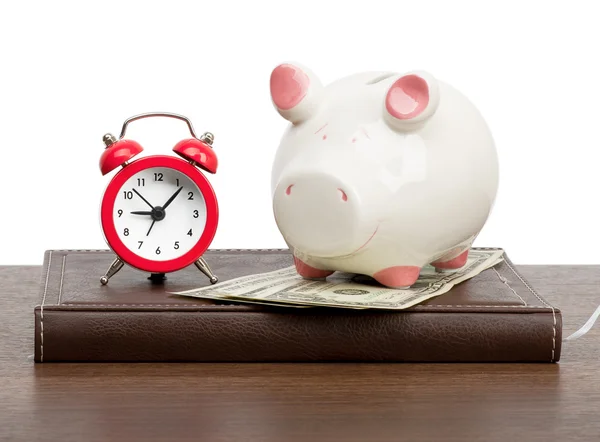 Alarm clock with piggy bank