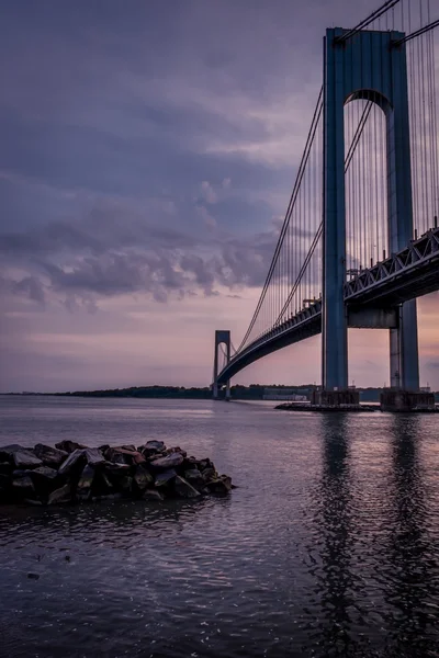 The bridge connecting Brooklyn to Staten Island named Verrazano bridge seen at dusk