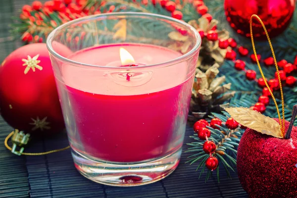Christmas  red   decorations woth glowing candle