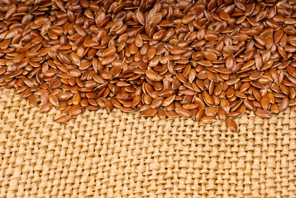 The flax seeds  on canvas  background