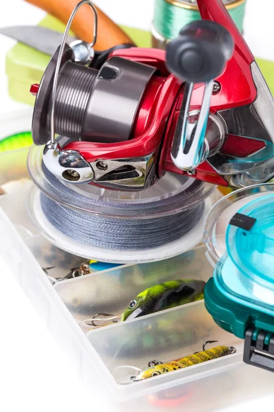 Fishing tackles and baits in storage boxes