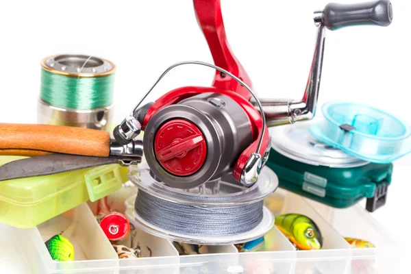 Fishing tackles and baits in storage boxes