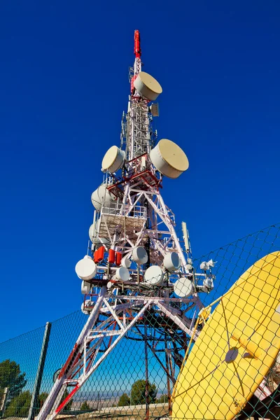 Communications tower, information medium