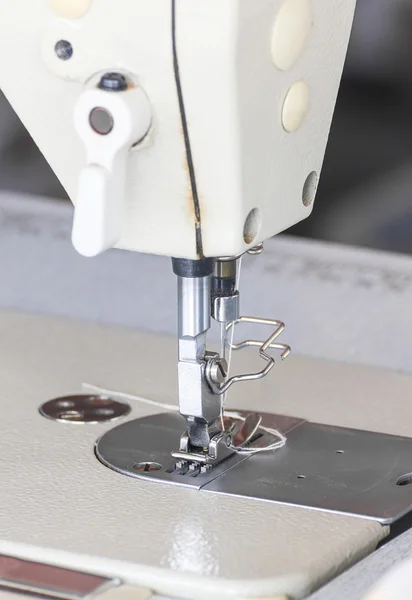 Close up industrial sewing machine