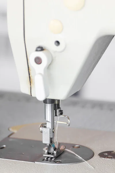 Close up industrial sewing machine