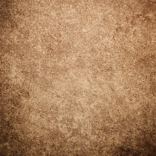 Grunge brown paper wall background or texture