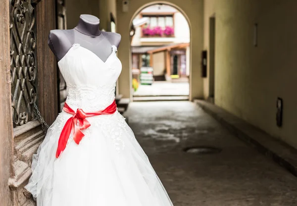 Wedding dress on mannequin outside