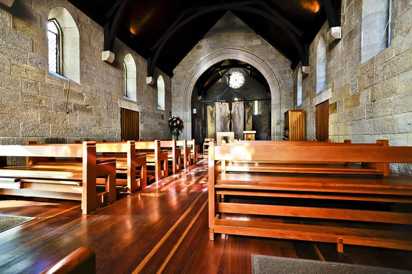 Inside of an old church room made in wood