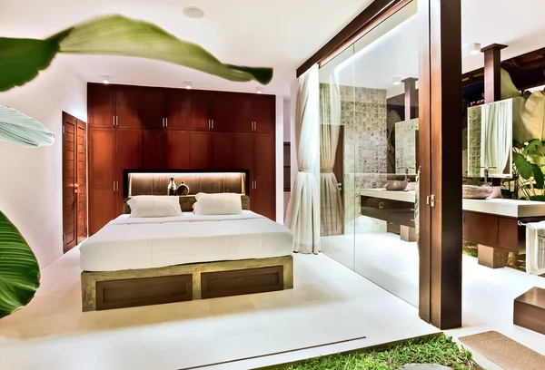 Modern bedroom with the natural decor design in a house