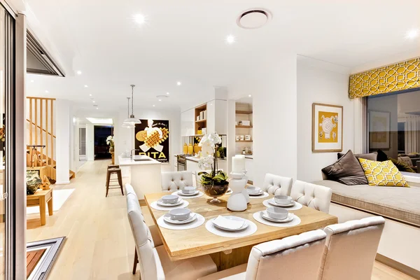 Dining set up with wooden table  in the living room