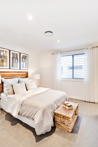 Classic bedroom with a pillow and blanket