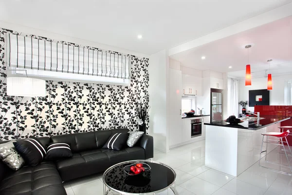 Living room decoration using fancy lights and black vine art on