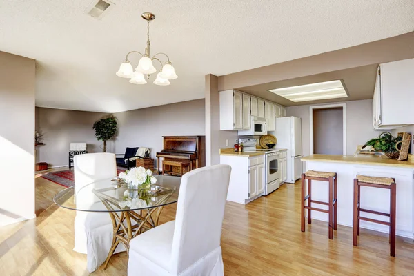 Dining area connected to kitchen and living room