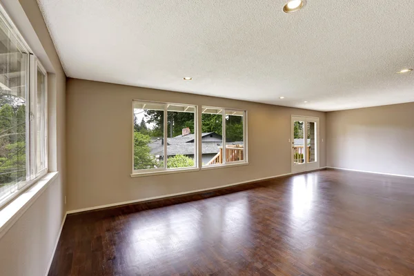 Empty house in light ivory color with hardwood floor