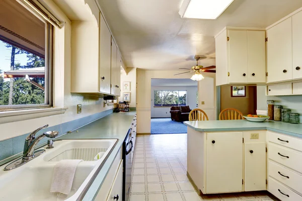 White empty simple old kitchen interior