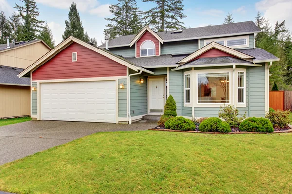 Classic American house with red and blue trim