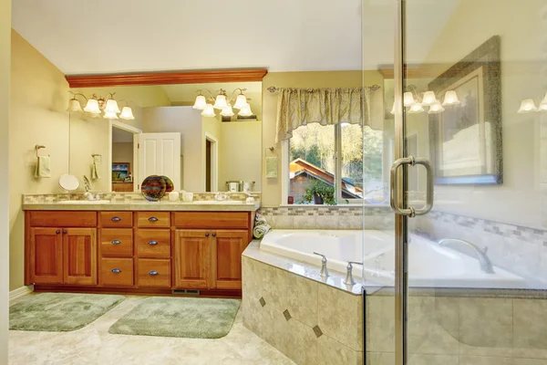 Luxury bathroom interior with tile floor.