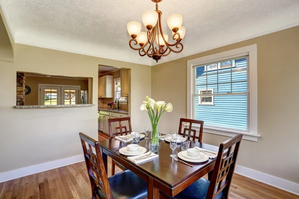 Open floor plan. View from dining area with wooden table set.