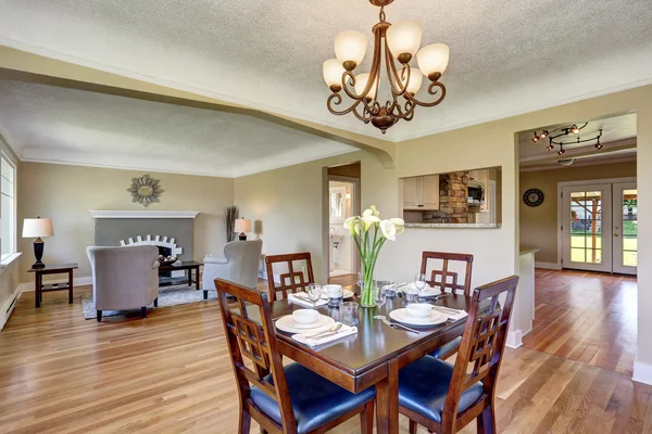 Open floor plan. View from dining area with wooden table set.