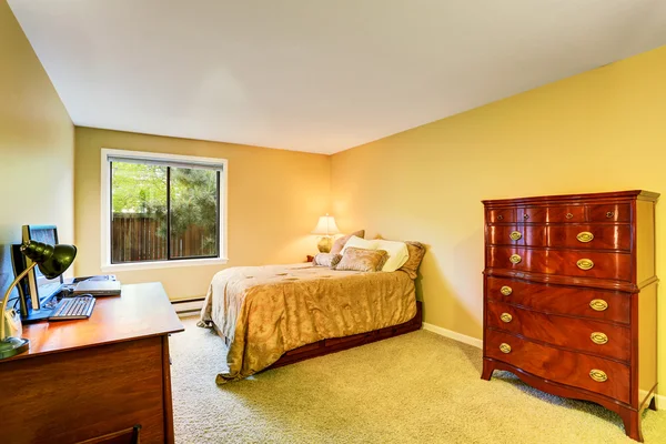 Traditional bedroom interior with carpet floor and nice bedding