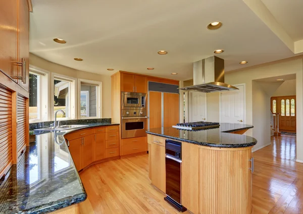 Modern style kitchen interior with large kitchen island