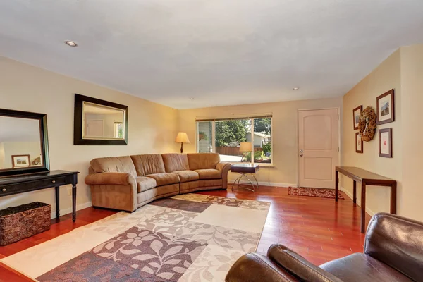 Cozy Spacious living room with cherry wood floor.