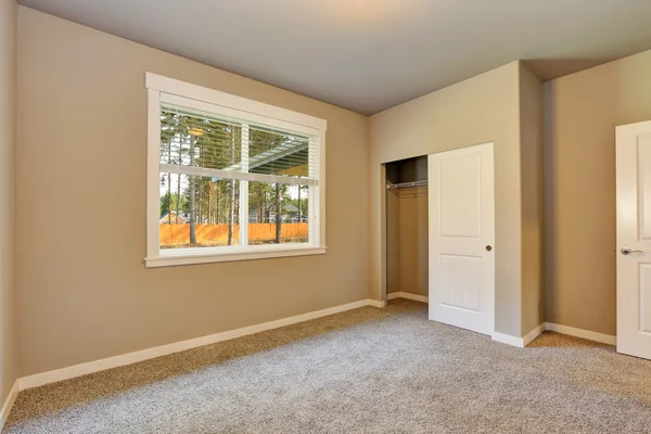 Brand new house construction interior. Empty room with closet.